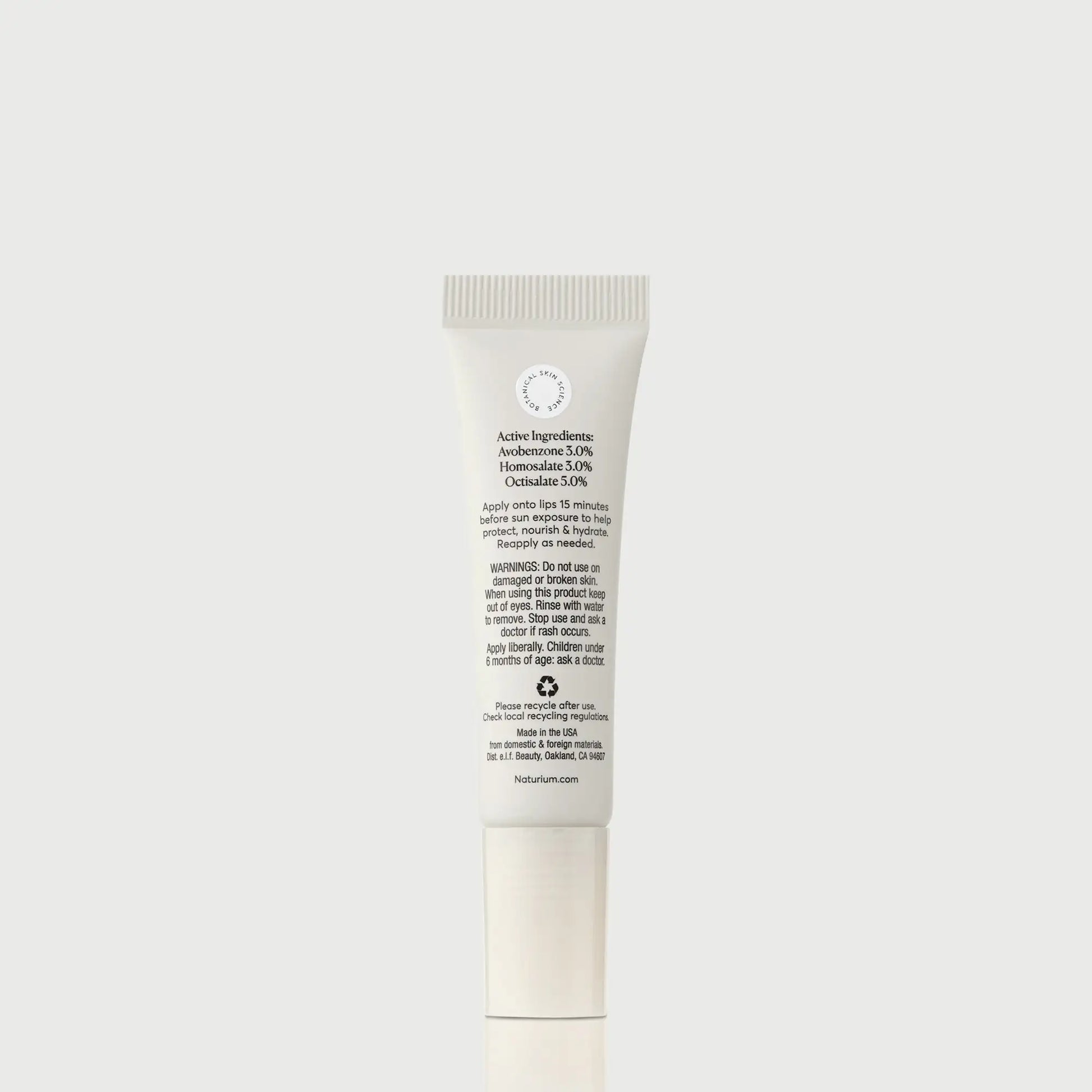 phyto-glow-lip-balm-spf-45-clear-e8 NATR-10124_PhytoGlow_SPF_Clear_primary_capon_back_bonebkgd_1.webp