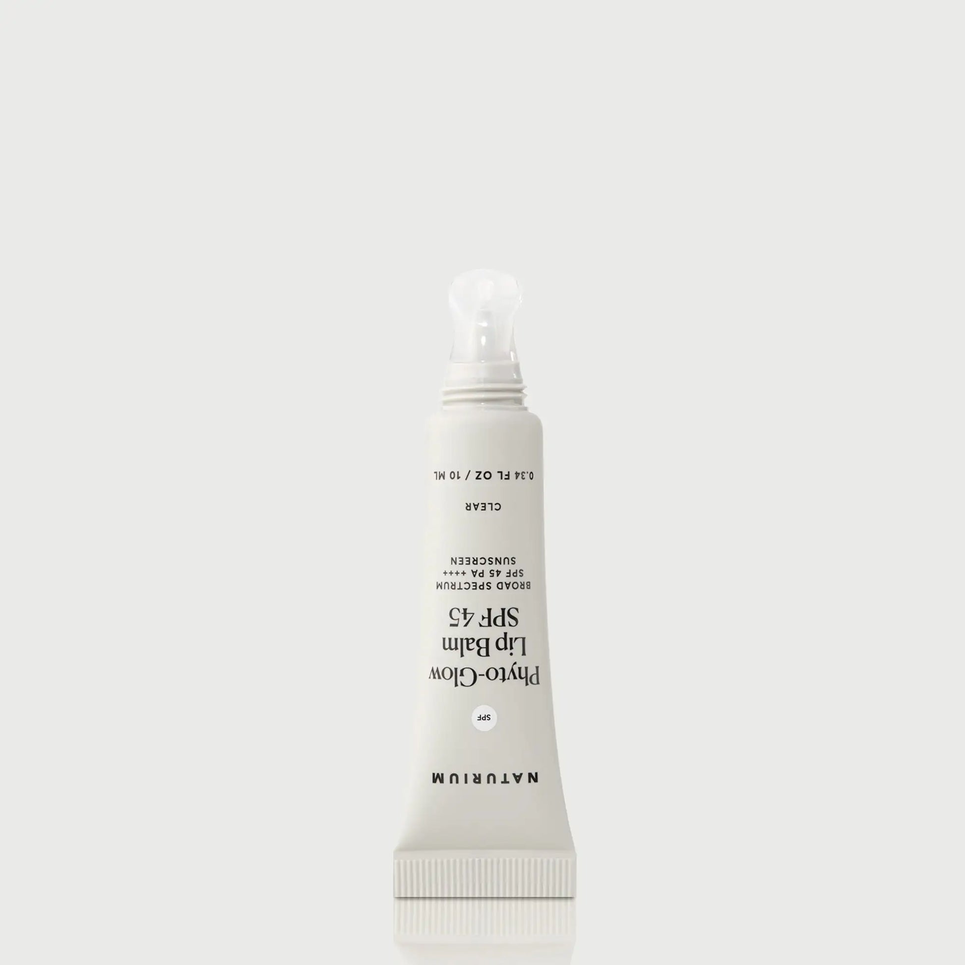 phyto-glow-lip-balm-spf-45-clear-e8 NATR-10124_PhytoGlow_SPF_Clear_primary_nocap_bonebkgd_1.webp