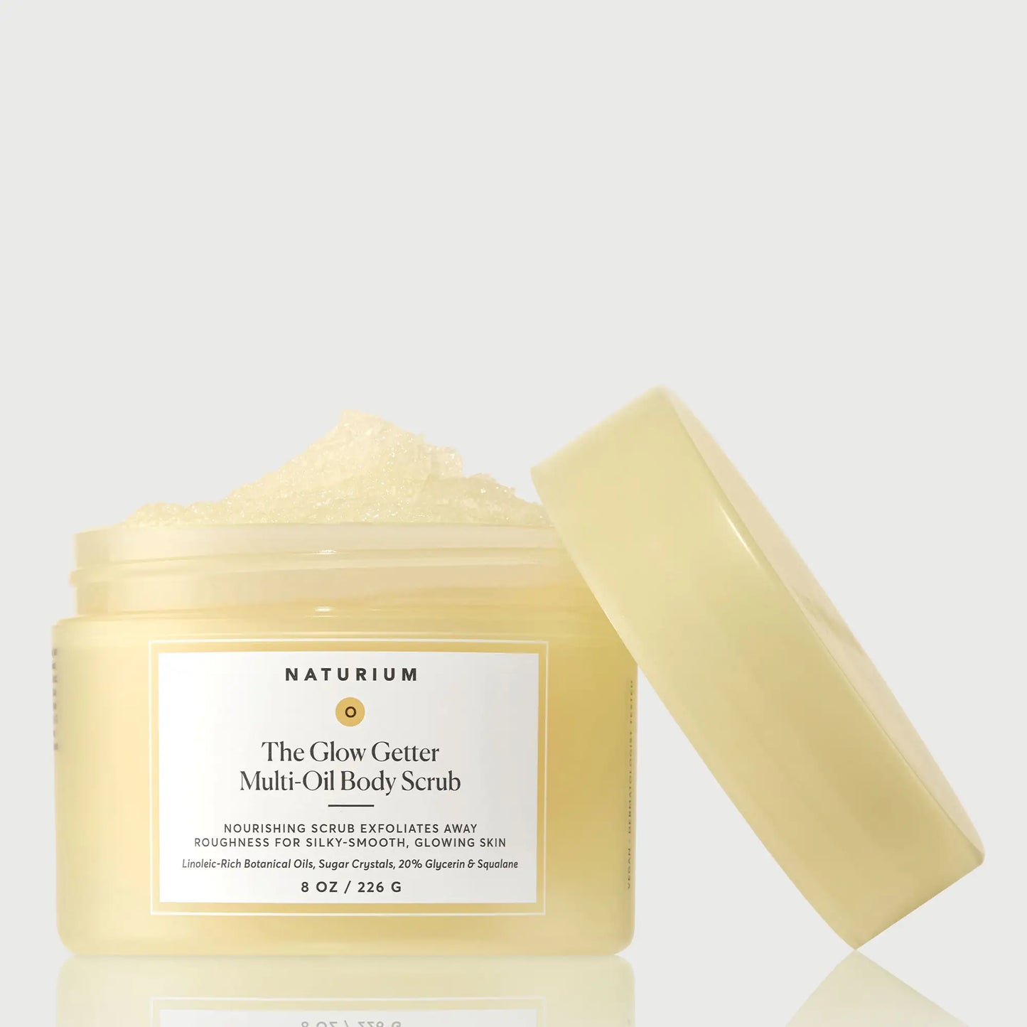 the-glow-getter-multi-oil-body-scrub-k8 NATR-40028-GlowGetter-Multi-Oil-Body-Scrub-Front-CapOff-bonebkgd.webp