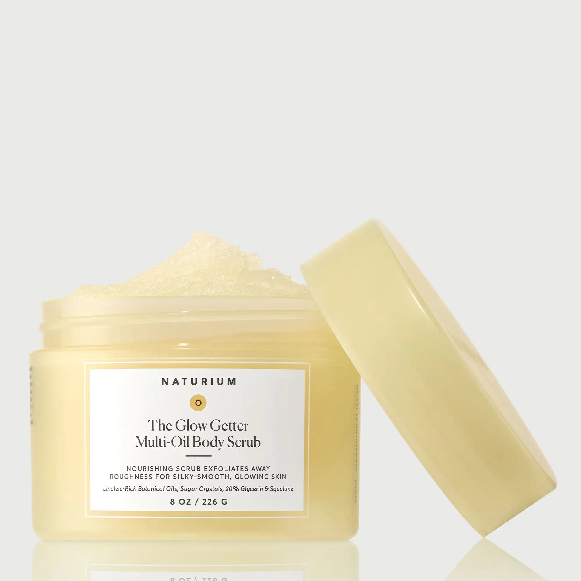 the-glow-getter-multi-oil-body-scrub-k8 NATR-40028-GlowGetter-Multi-Oil-Body-Scrub-Front-CapOff-bonebkgd.webp